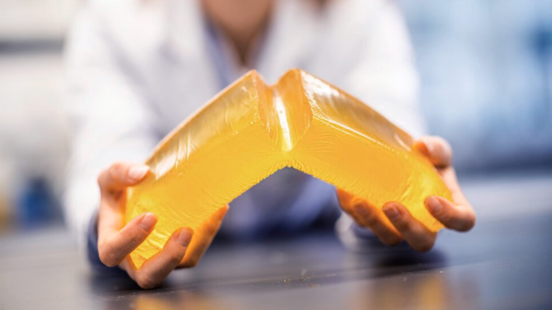 Hands-holding-hotmelt-block