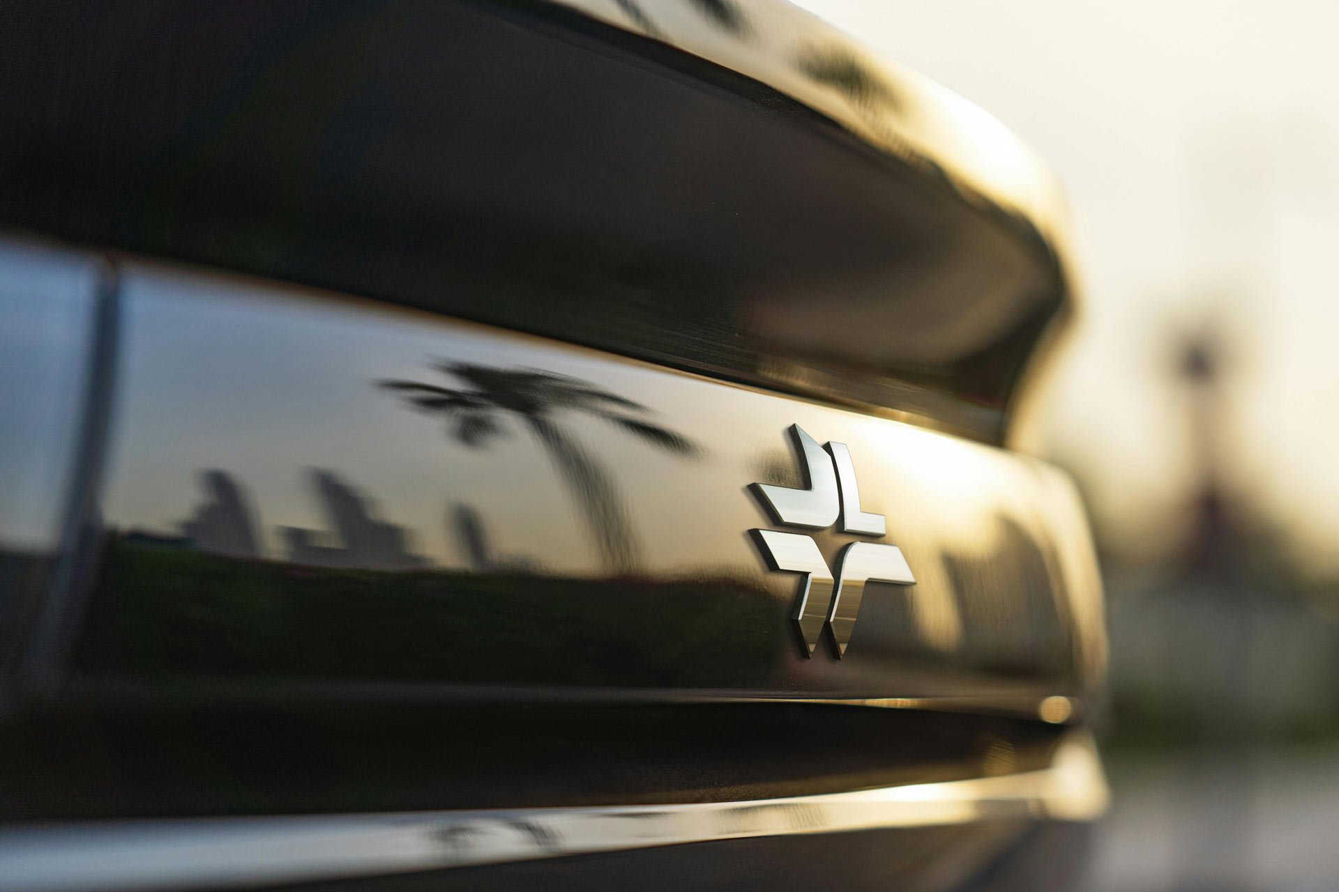 Automotive-paint-surface-with-emblem-lettering