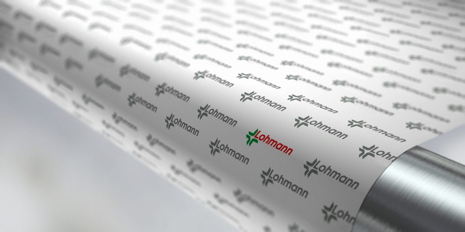 Graphics-pressure-roller-with-lohmann-logos