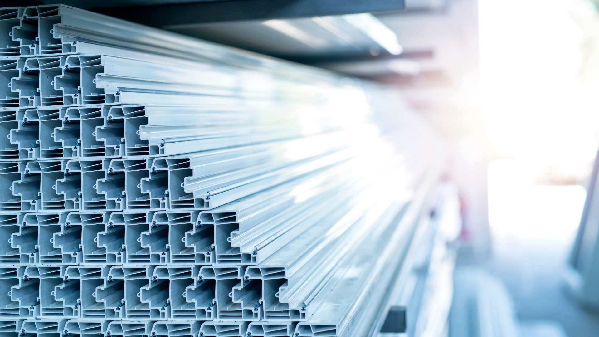 Industrial-tape-application-plastic-extrusion-profiles-in-warehouse