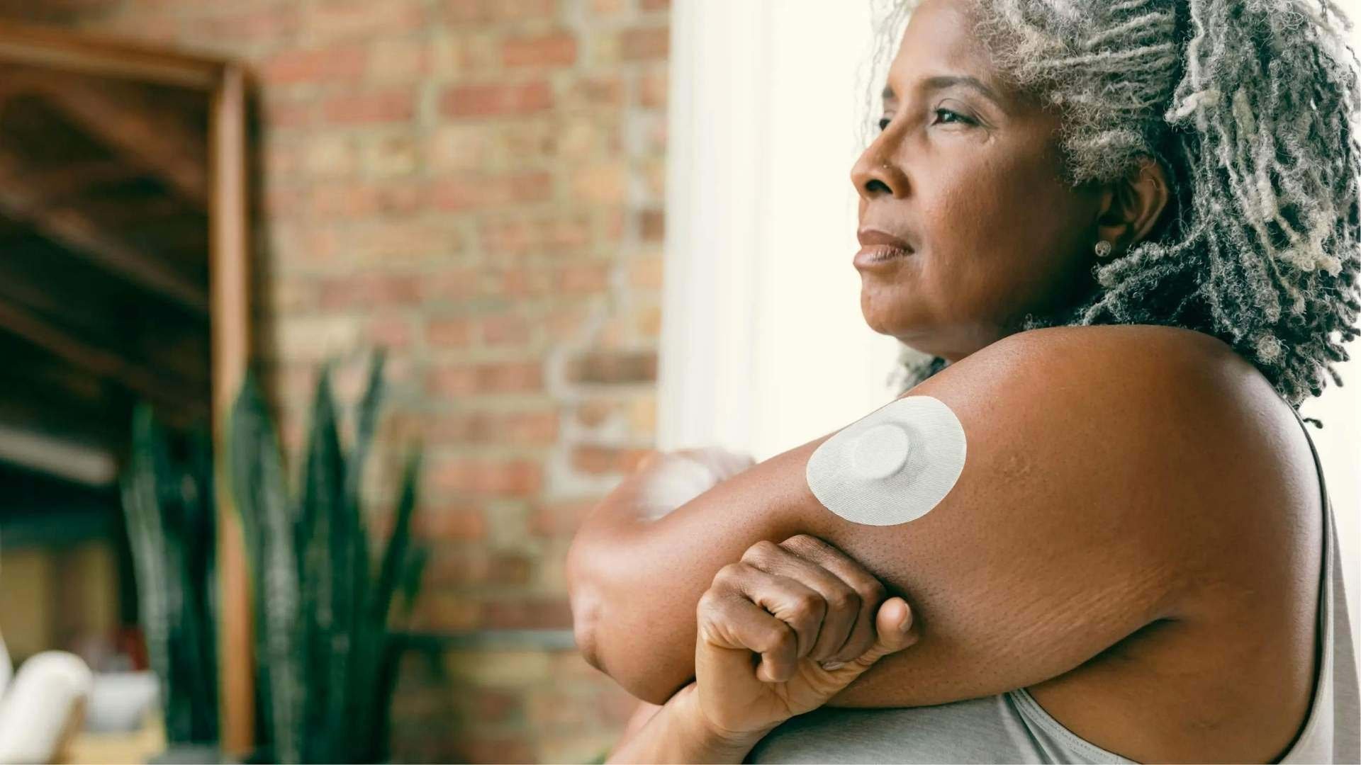 Medical-wearables-woman-with-cgm-sensor-on-left-arm