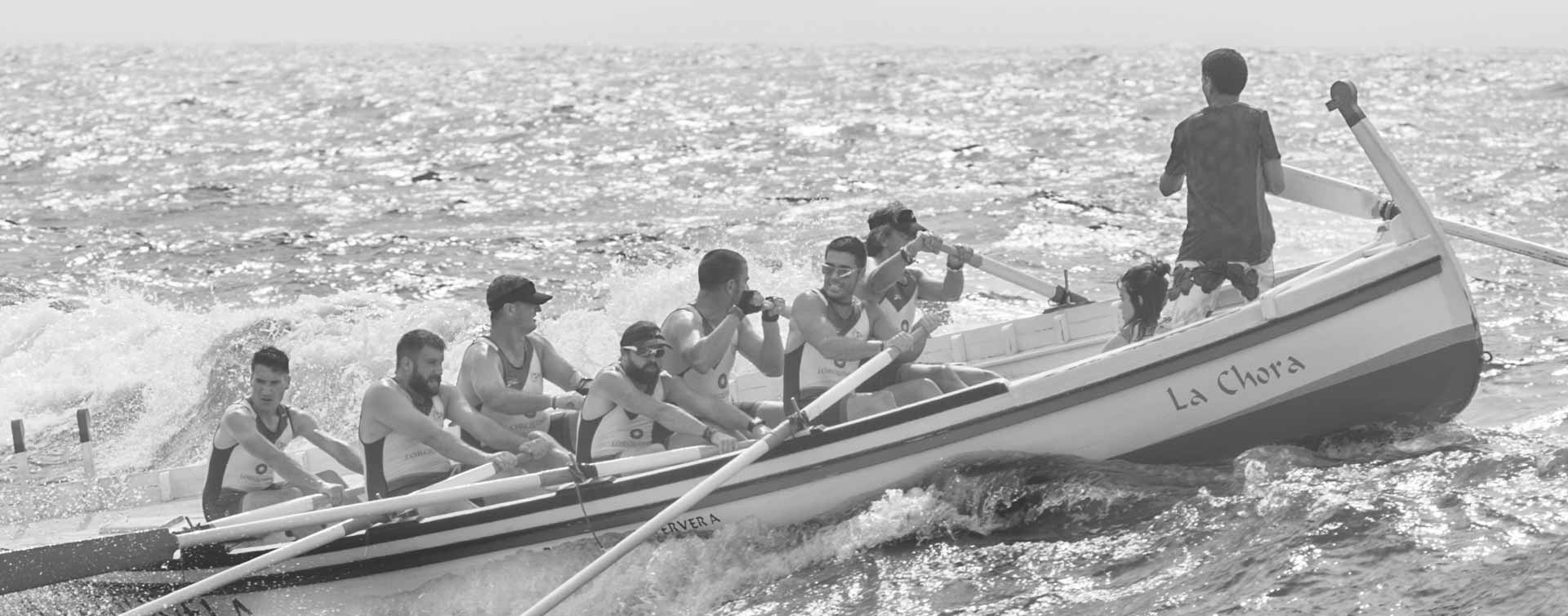 Value-passion-seven-men-in-rowing-boat-with-helmsman Value-passion-seven-men-in-rowing-boat-with-helmsman