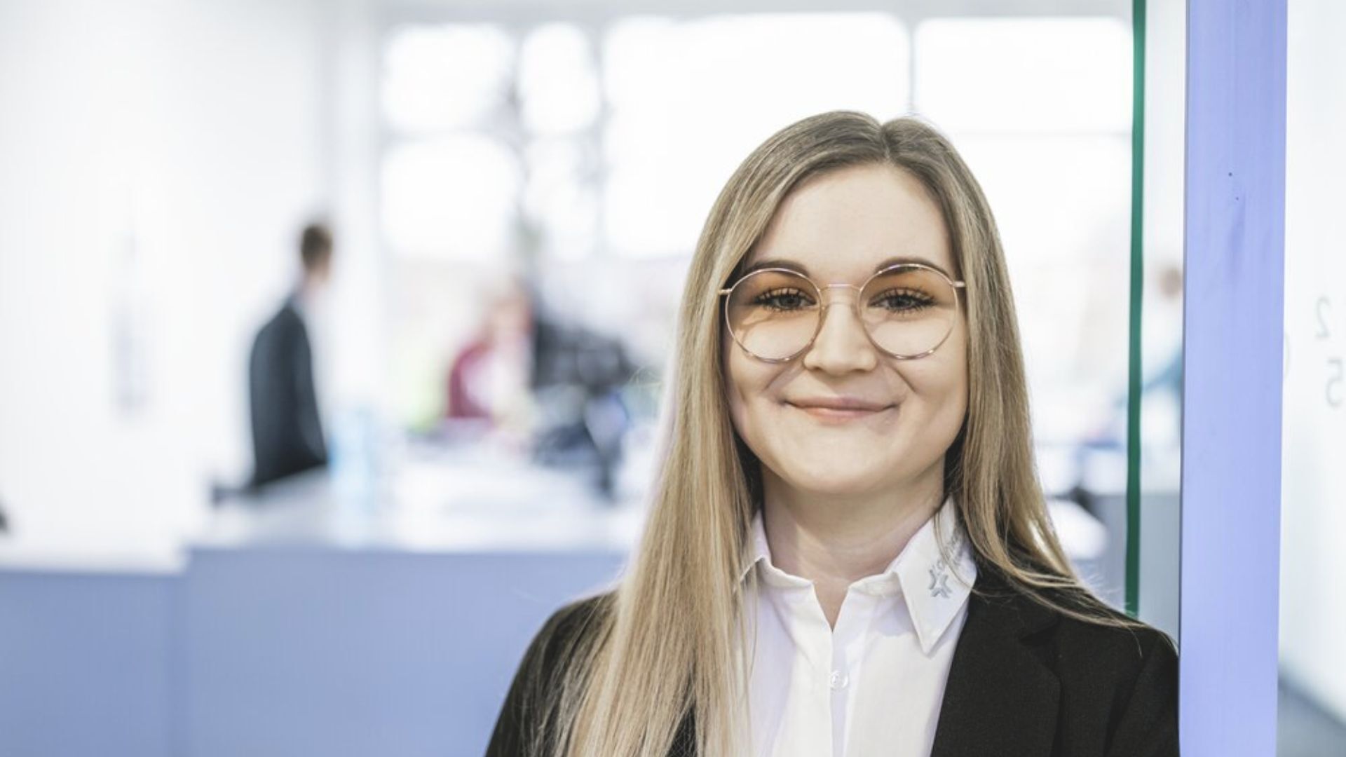 Female-colleague-smiling-office attire