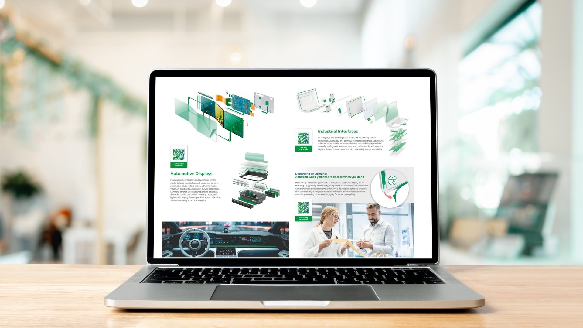 Laptop-on-desk-file-download-display-flyer