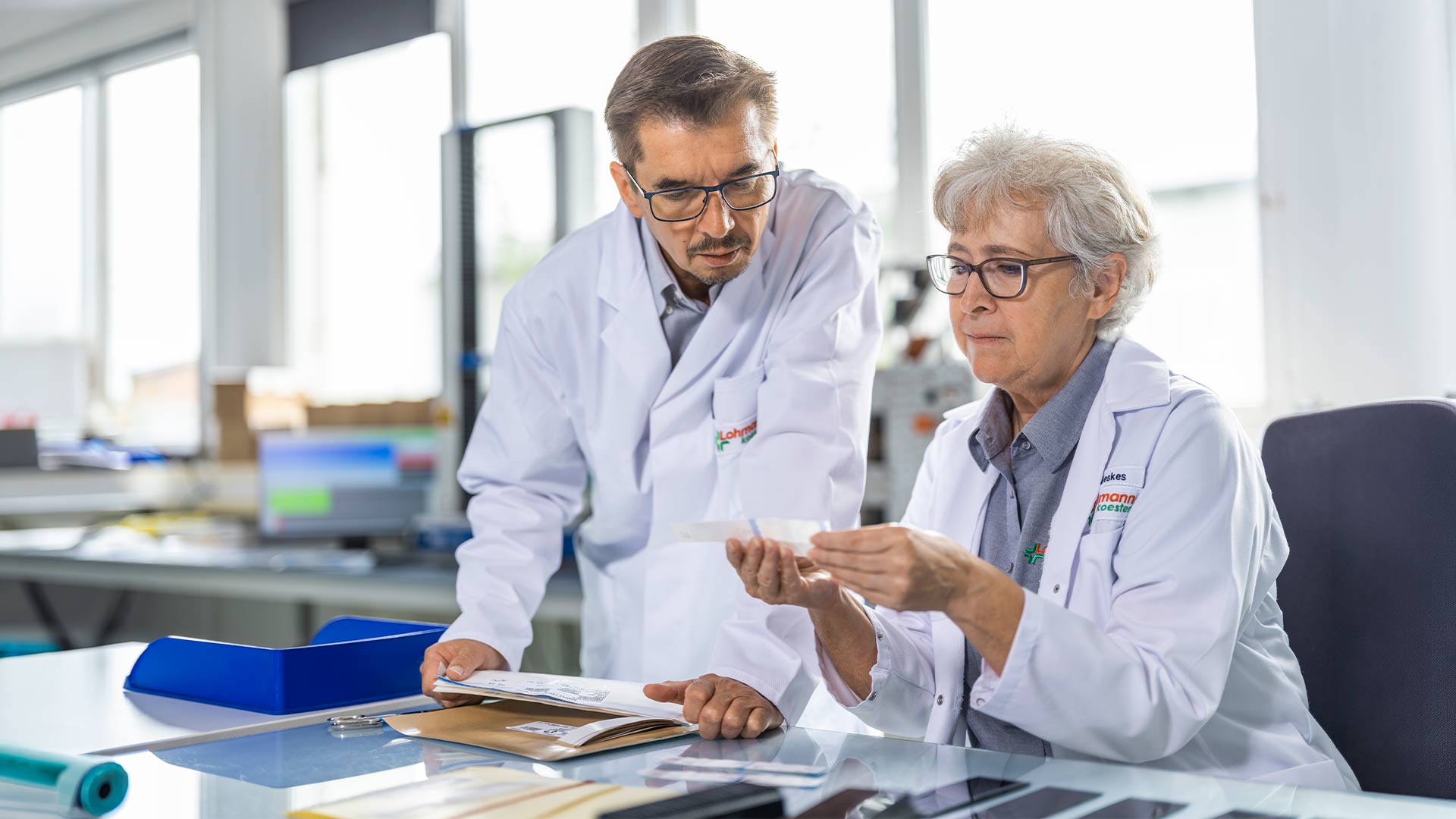 Elder-man-and-elder-women-analyzing-tape-koester