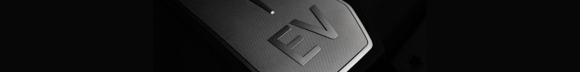 EV-sign-silver-on-black-background